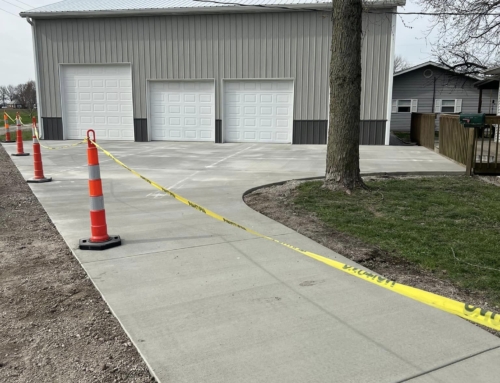 Grey Barn with Smooth Concrete Driveway